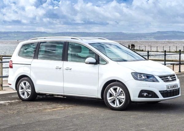 White SEAT Alhambra parked at the beach.