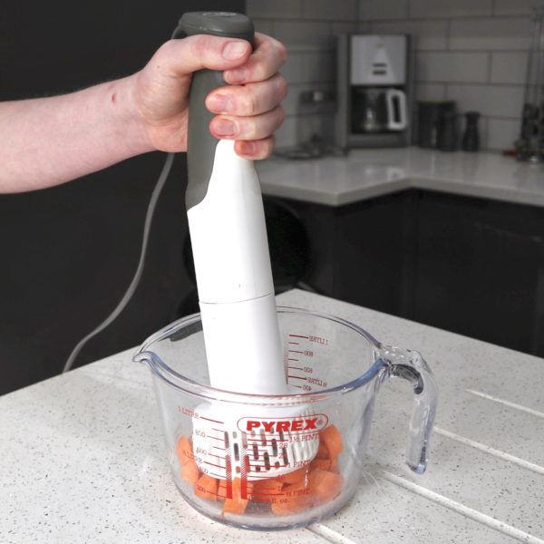 White Sensio Electric Masher With A Grey Blade
